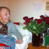 Missionary Anna Kristensen receiving 20 red roses